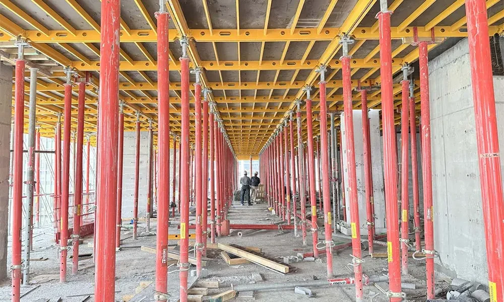 What factors influence the design of formwork for complex architectural shapes in concrete?